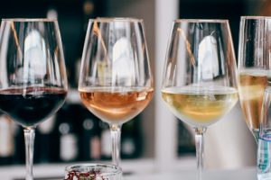 a group of wine glasses sitting on top of a table